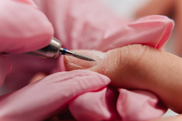 How to hold an electric nail drill correctly